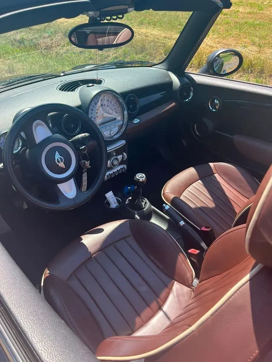 Gebraucht Mini One Cabriolet 98 PS (72 kW) 2010 Schwarz Cabrio