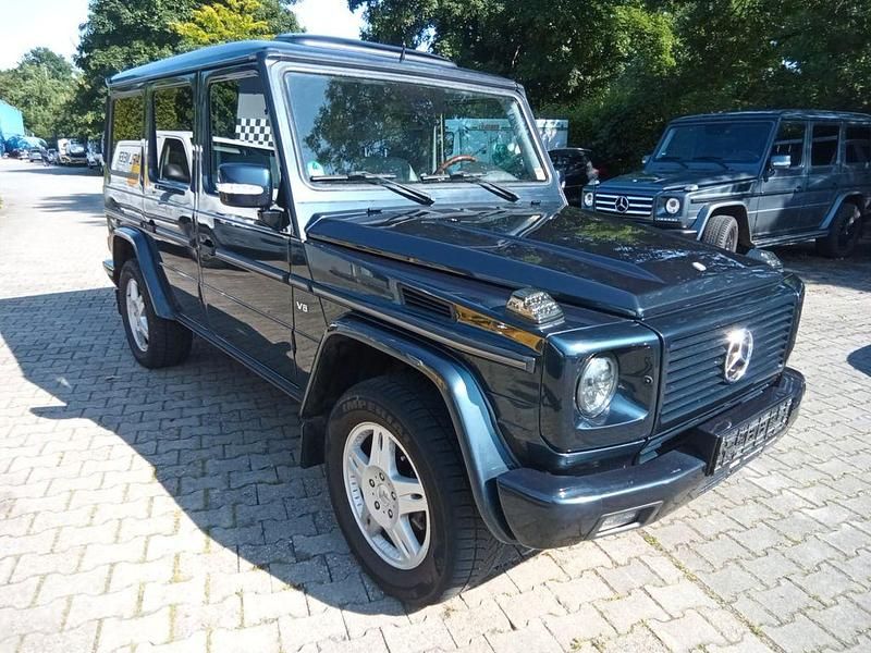 Smaragdschwarz metallic Gebraucht 2006 Mercedes G500 SUV | 32.400 € - Bild 1/4