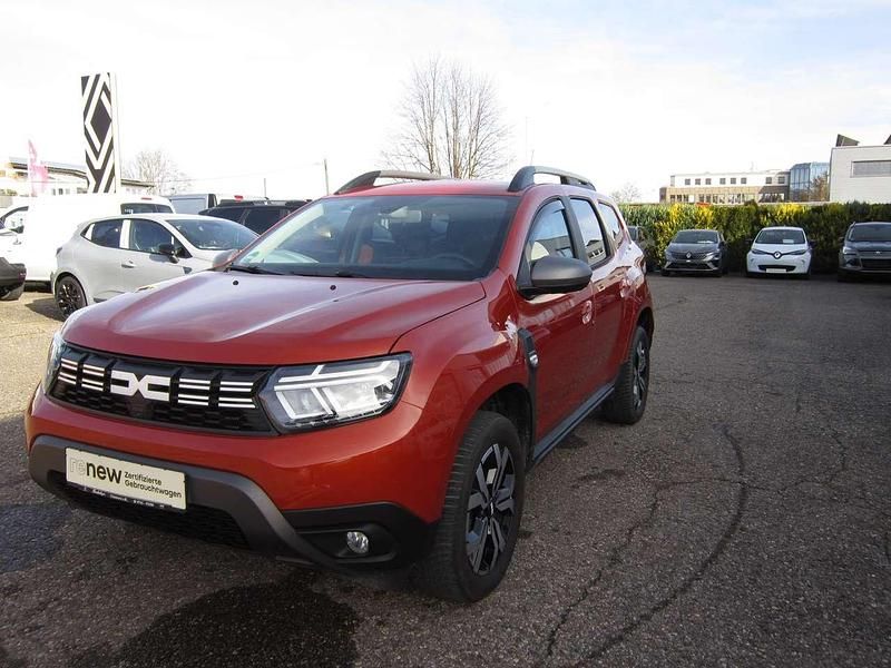 Orange (metallic) Gebraucht 2023 Dacia Duster Journey SUV | 23.490 € (Fairer Preis) - Bild 1/4