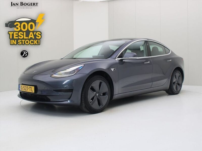 Grau Gebraucht 2019 Tesla Model 3 Standard Range Limousine | 18.400 € (Fairer Preis) - Bild 1/4