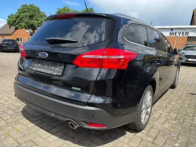 Gebraucht Ford Focus Titanium 150 PS (110 kW) 2016 Iridiumschwarz metallic Kombi