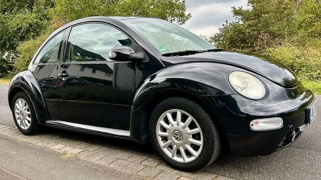 Gebraucht VW New Beetle 102 PS (75 kW) 2004 Schwarz Kleinwagen