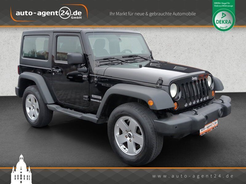 Schwarz metallic Gebraucht 2013 Jeep Wrangler Sport SUV | 30.990 € (Etwas zu teuer) - Bild 1/4