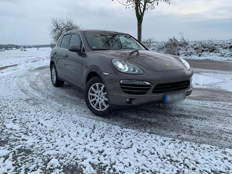 Braun Gebraucht 2012 Porsche Cayenne SUV | 19.299 € (Superpreis) - Bild 1/4