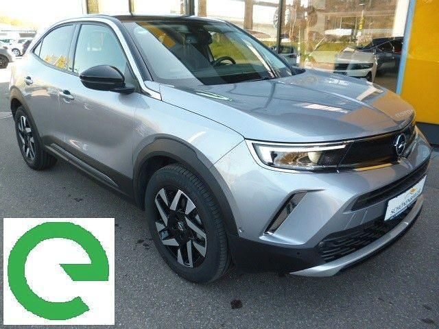 Grau Gebraucht 2021 Opel Mokka-e Elegance SUV | 17.990 € (Fairer Preis) - Bild 1/4