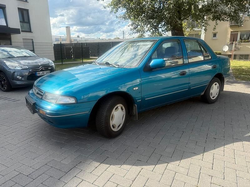 Grün Gebraucht 1996 Kia Sephia 2 Limousine | 1.250 € - Bild 1/4