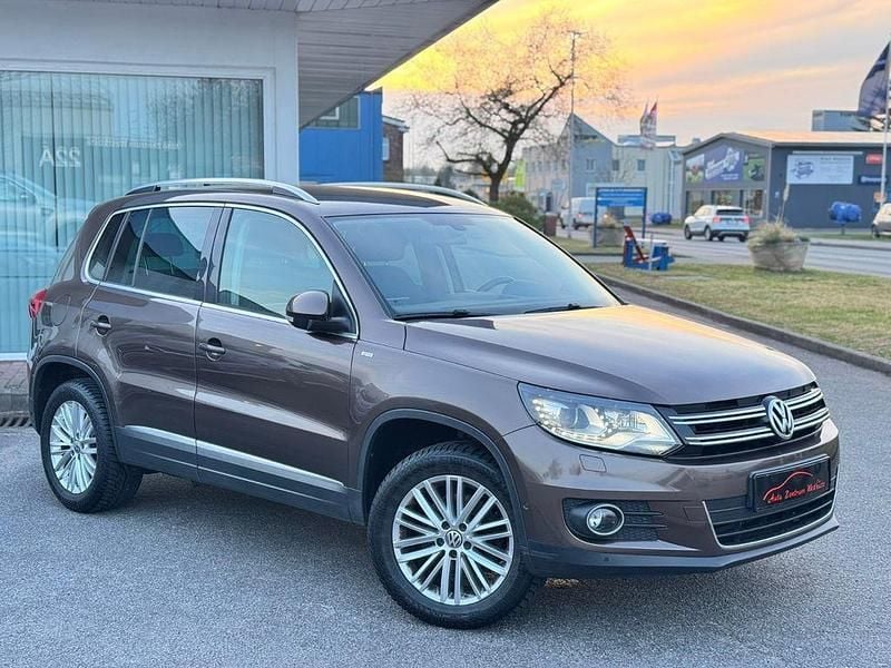 Braun Gebraucht 2014 VW Tiguan Sportline SUV | 8.975 € (Fairer Preis) - Bild 1/4