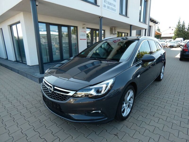 Grau Gebraucht 2016 Opel Astra Dynamic Kombi | 7.890 € (Fairer Preis) - Bild 1/4