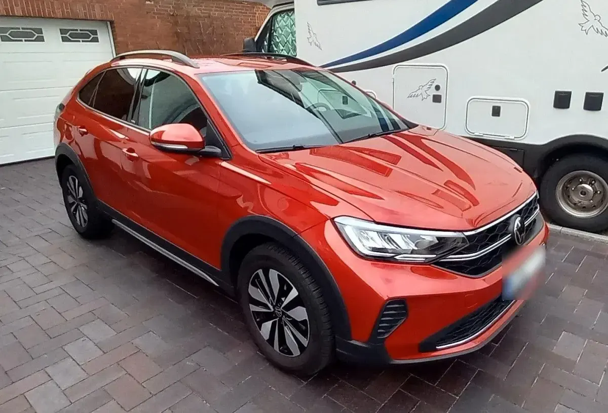 Używany VW Taigo Move 110 KM (80 kW) 2024 Czerwony SUV