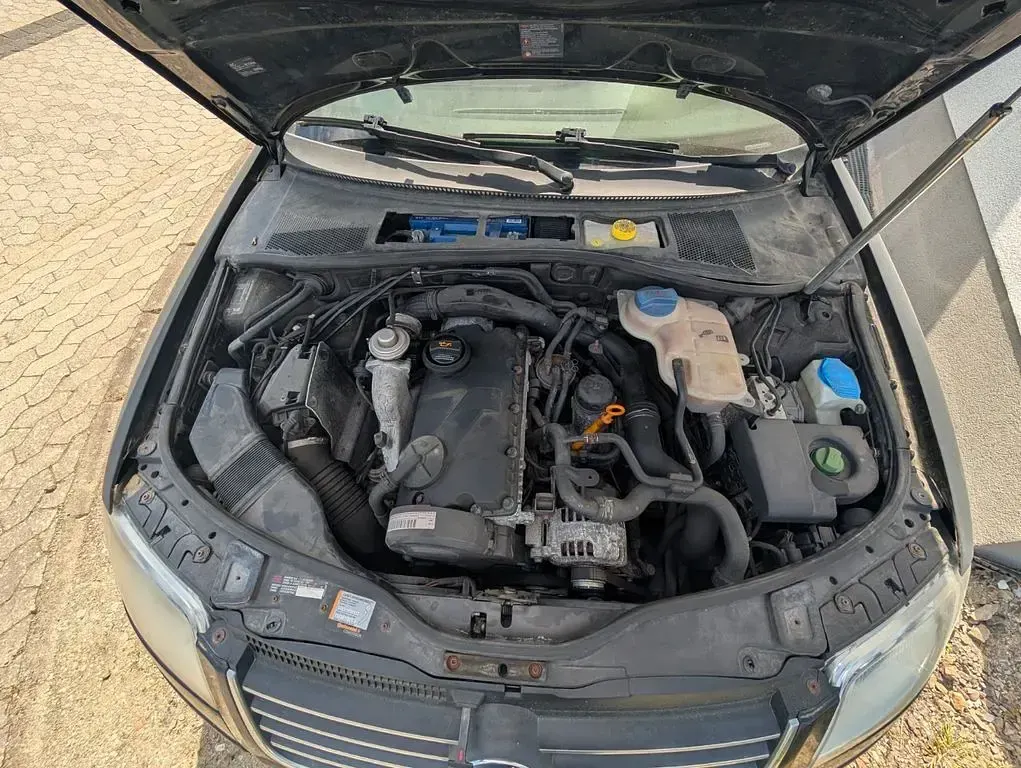 Second-hand VW Passat 131 CP (96 kW) 2003 Negru Berlinǎ