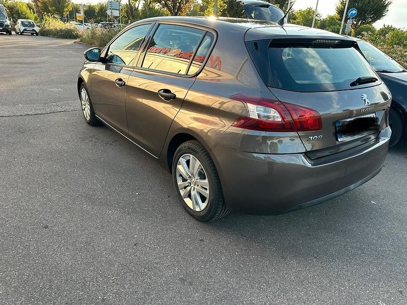 Grau Gebraucht 2014 Peugeot 308 Limousine | 6.200 € (Fairer Preis) - Bild 1/4