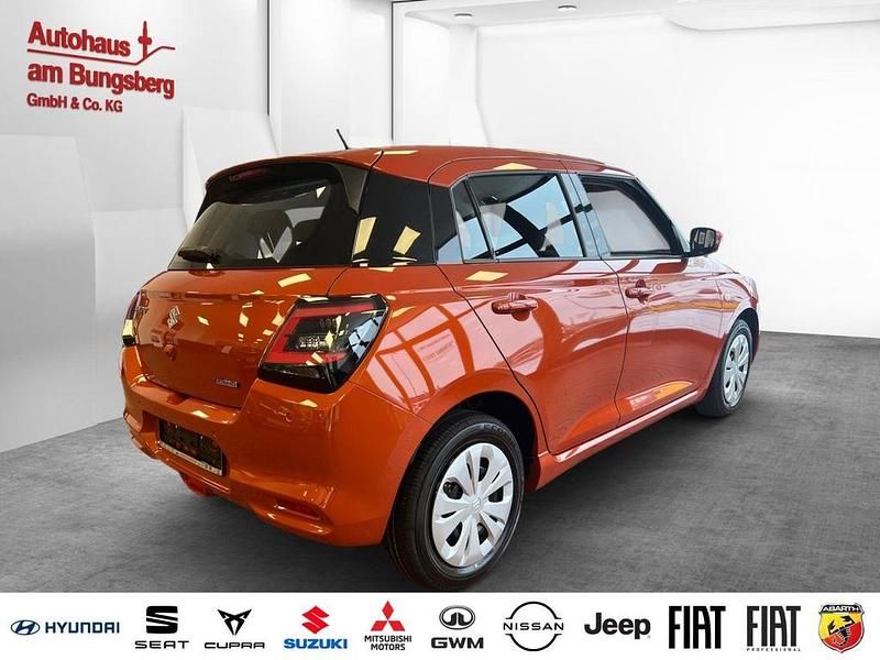 Neu Suzuki Swift Club 83 PS (61 kW) 2026 Orange Limousine