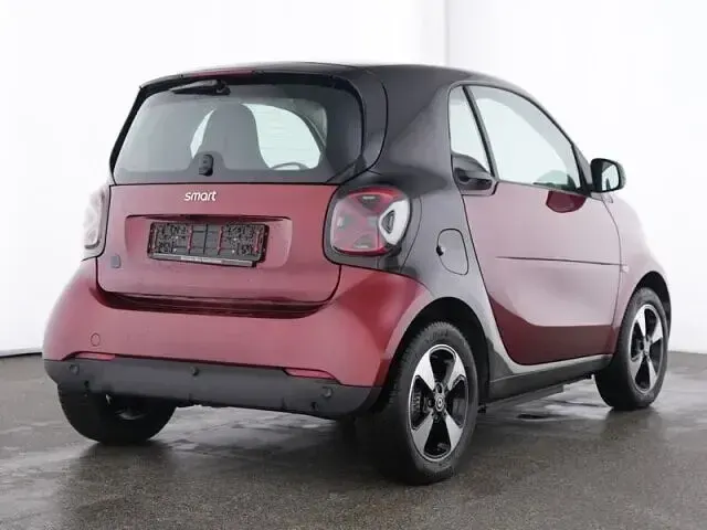 Gebraucht Smart ForTwo Electric Drive Exclusive 60 kW (82 PS) 2024 Bodypanels in carmine red () Coupé