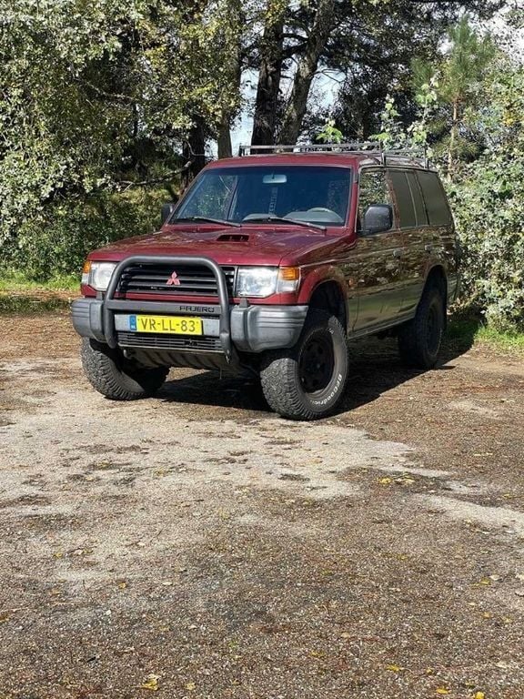 Rot Gebraucht 1997 Mitsubishi Pajero SUV | 7.990 € - Bild 1/4