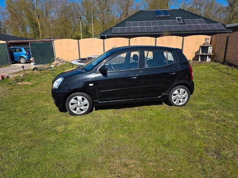 Second-hand Kia Picanto EX 65 CP (47 kW) 2006 Portocaliu Hatchback