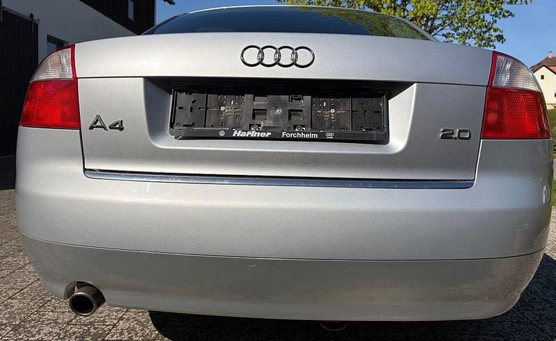 Używany Audi A4 131 KM (96 kW) 2003 Srebrny Sedan/Limuzyna