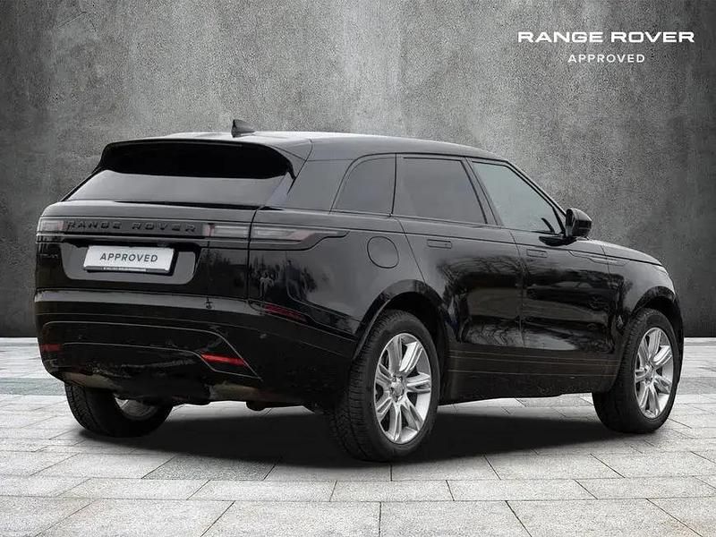 Santorini black metallic Gebraucht 2024 Land Rover Range Rover Velar SE Dynamic SUV | 73.900 € - Bild 1/4