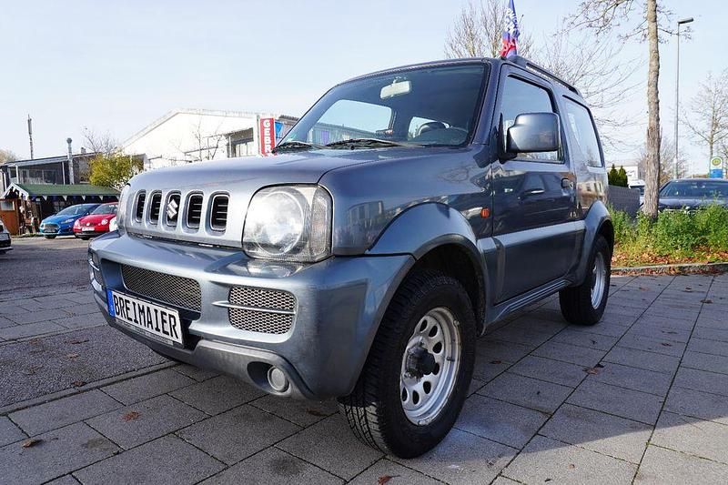Grau Gebraucht 2007 Suzuki Jimny SUV | 7.950 € (Fairer Preis) - Bild 1/4