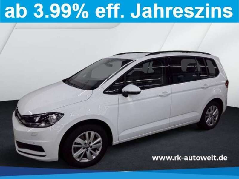 Weiss Gebraucht 2024 VW Touran Comfortline Van / Kleinbus | 31.198 € (Fairer Preis) - Bild 1/4