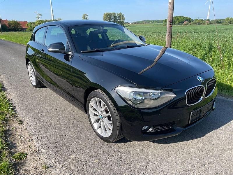 Schwarz Gebraucht 2012 BMW 114 Sport Line Kleinwagen | 4.750 € (Fairer Preis) - Bild 1/4