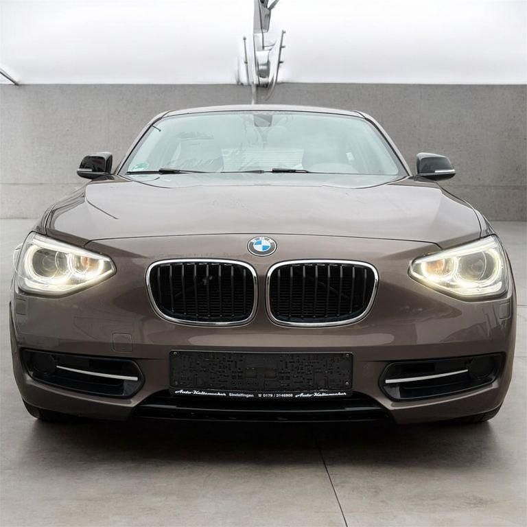 Gebraucht BMW 118 Sport Line 170 PS (125 kW) 2014 Sparkling bronze metallic Kleinwagen