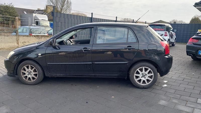Gebraucht Toyota Corolla 96 PS (70 kW) 2003 Schwarz Limousine