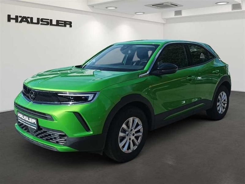 Matcha grün (metallic) Gebraucht 2022 Opel Mokka-e SUV | 16.890 € (Superpreis) - Bild 1/4