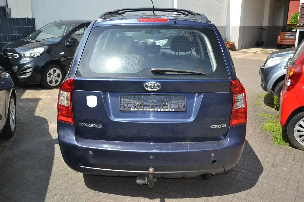 Gebraucht Kia Carens LX 140 PS (102 kW) 2009 Blau Van / Kleinbus