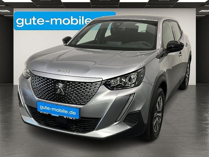 Grau Gebraucht 2023 Peugeot e-2008 Active SUV | 18.890 € (Superpreis) - Bild 1/4
