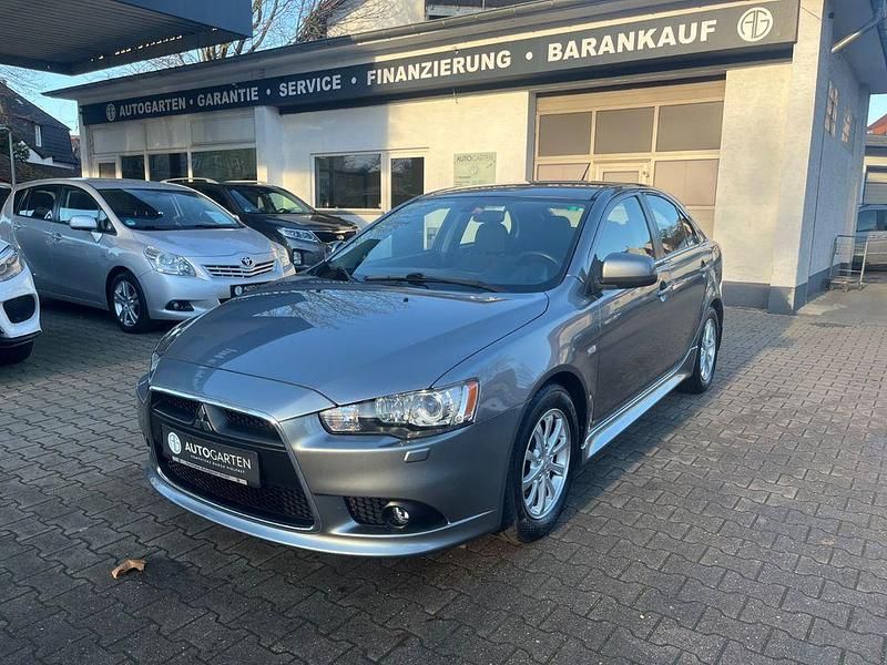 Gebraucht Mitsubishi Lancer 117 PS (86 kW) 2013 Titanium grey (metallic) Limousine