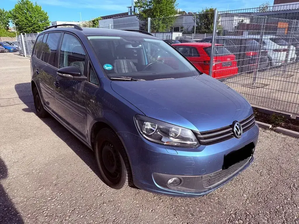 Używany VW Touran Match 105 KM (77 kW) 2012 Szary Minivan