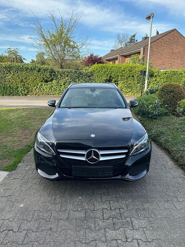 Schwarz Gebraucht 2014 Mercedes C180 Kombi | 11.400 € (Fairer Preis) - Bild 1/4
