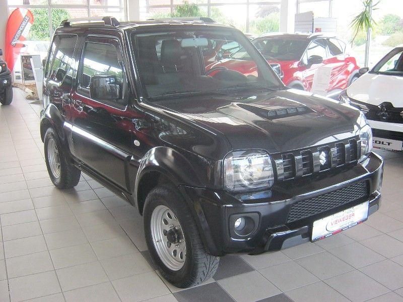 Schwarz Gebraucht 2017 Suzuki Jimny Style SUV | 20.590 € (Teuer) - Bild 1/4