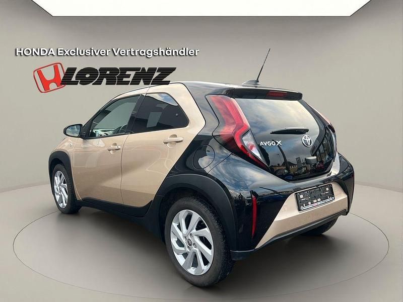Gebraucht Toyota Aygo X Pulse 72 PS (52 kW) 2022 Gold schwarz metallic SUV