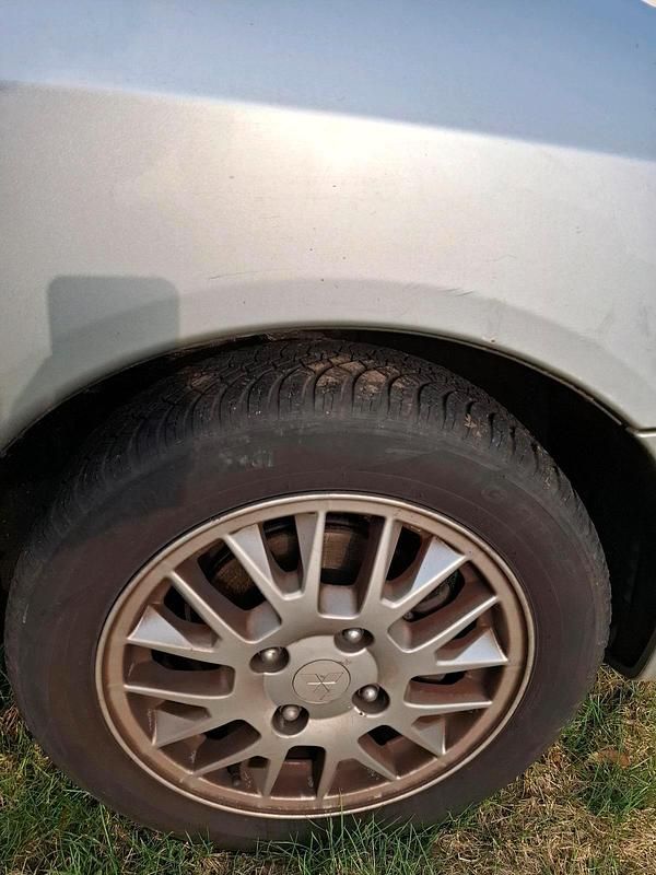 Gebraucht Mitsubishi Space Star 82 PS (60 kW) 2003 Grau Van / Kleinbus