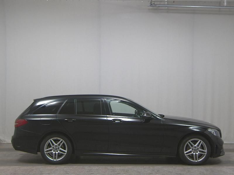 Schwarz Gebraucht 2021 Mercedes C220 AMG line Kombi | 19.280 € (Superpreis) - Bild 1/4