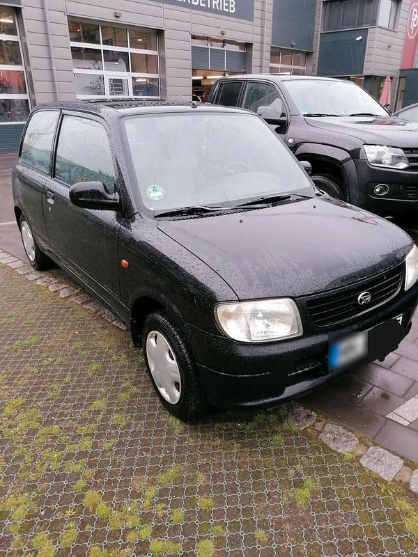 Gebraucht Daihatsu Cuore 56 PS (41 kW) 2002 Schwarz Kleinwagen