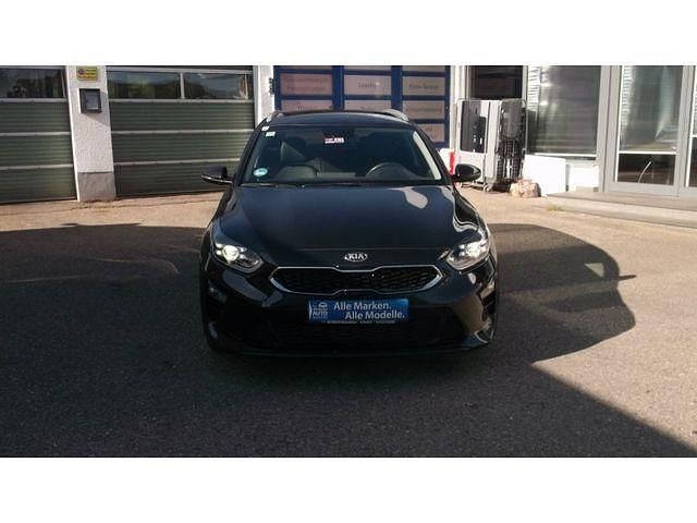 (1k) black pearl m Gebraucht 2021 Kia Ceed Sportswagon Kombi | 16.790 € (Fairer Preis) - Bild 1/4