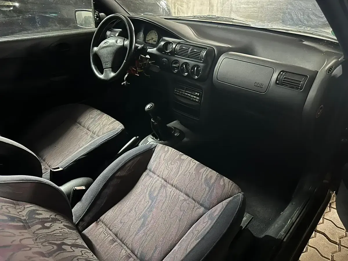 Gebraucht Ford Escort Cabriolet 105 PS (77 kW) 1996 Rot Cabrio