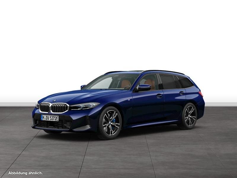 Blau Gebraucht 2024 BMW 330e Kombi | 58.529 € - Bild 1/3