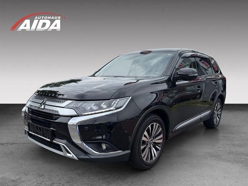 Pantherschwarz Gebraucht 2019 Mitsubishi Outlander Diamant Edition SUV | 22.890 € (Teuer) - Bild 1/4