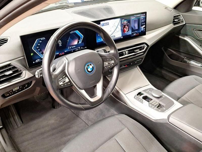 Gebraucht BMW 320e 163 PS (119 kW) 2022 Schwarz Kombi