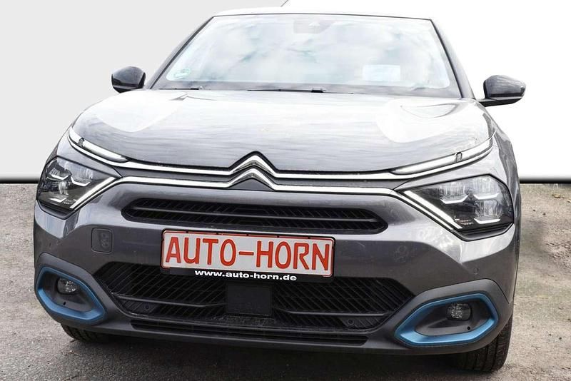 Gebraucht Citroën e-C4 Shine 100 kW (136 PS) 2023 Platinumgrau metallic Limousine