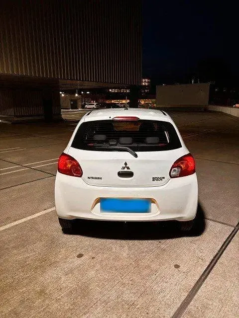 Gebraucht Mitsubishi Space Star 71 PS (52 kW) 2015 Weiß Kleinwagen