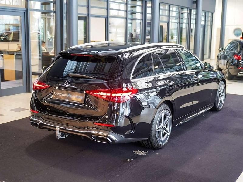 Gebraucht Mercedes C300e AMG line 313 PS (230 kW) 2024 Obsidianschwarz Kombi