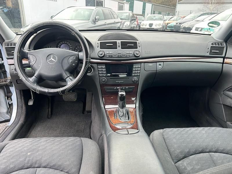 Second-hand Mercedes E200 163 CP (119 kW) 2003 Albastru Berlinǎ