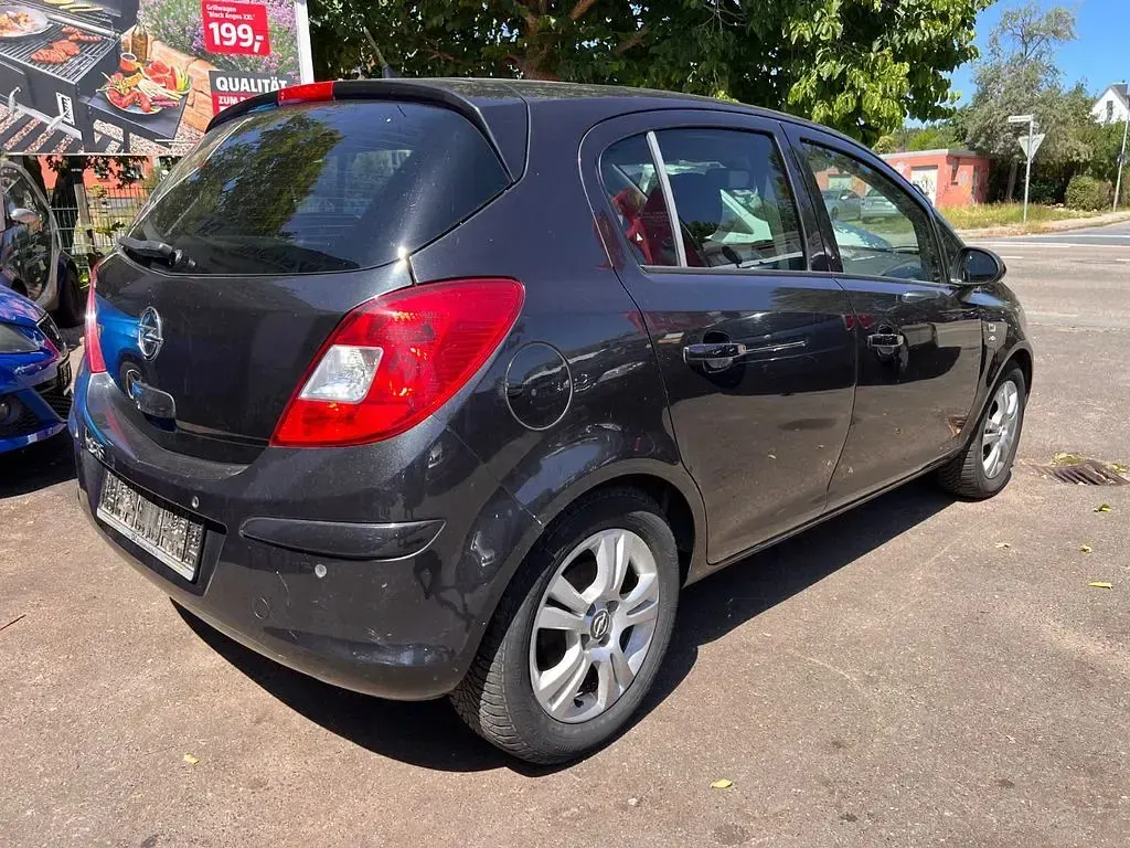 Gebraucht Opel Corsa Active 101 PS (74 kW) 2013 Schwarz Kleinwagen