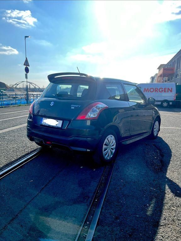 Gebraucht Suzuki Swift 94 PS (69 kW) 2012 Schwarz Kleinwagen