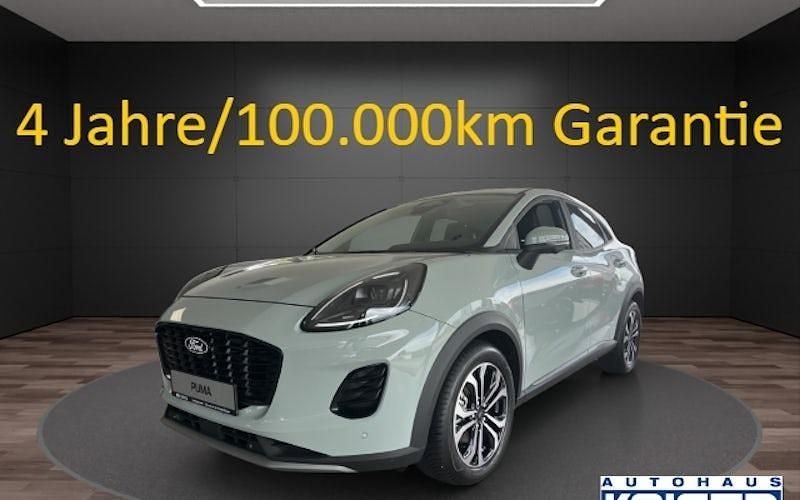 Grau Neu 2024 Ford Puma Gen-E Titanium SUV | 26.490 € - Bild 1/4