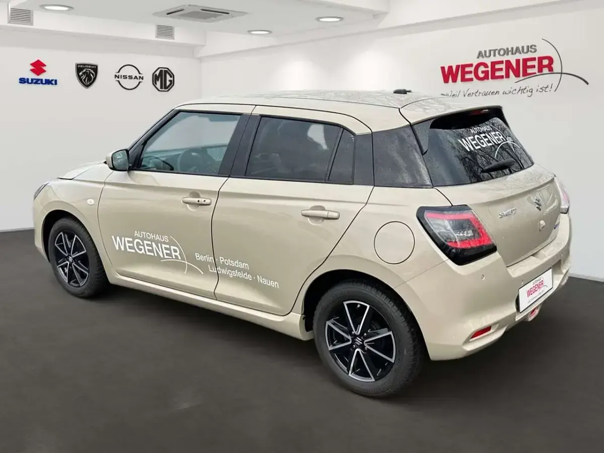Gebraucht Suzuki Swift Comfort 83 PS (61 kW) 2025 Caravan ivory Limousine